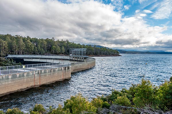 Clark dam wall at Butlers Gorge in Tasmania. The large expanse of water was whipped up by the wind.