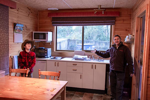 James and Graham in the kitchen area of our accommodation chalet