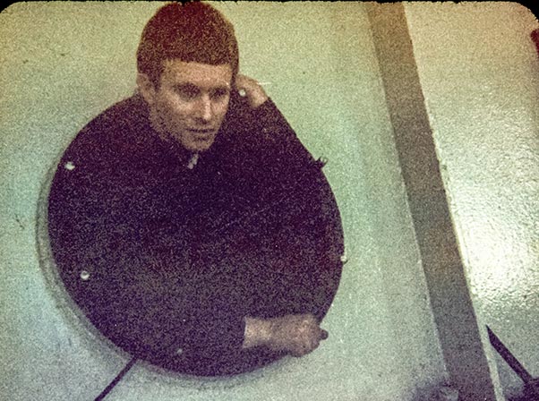 Graham photographed in mid 1960's as he was coming out of the inspection hole of a large hydro power turbine.