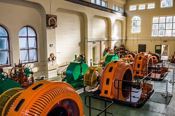 Three large turbines generating ower inside the lake Margaret Power Station
