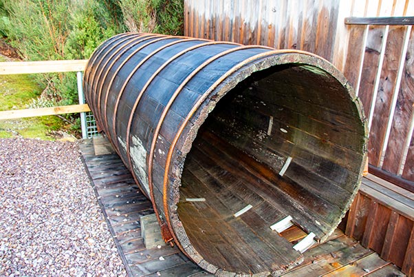 An old pipeline stave made of King Billy pine is on display near the lake Margaret Power Station in Tasmania