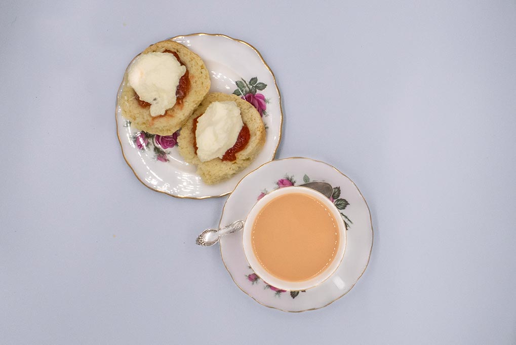 Devonshire tea served on rose china.