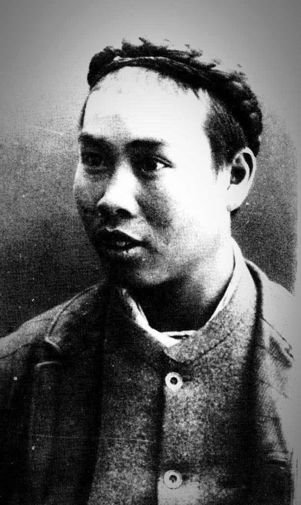 Old black and white portrait of a young Chinese man. This Chinese immigrant has become the face of Henrys story.