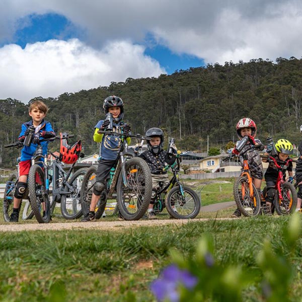 A group of child mountain-bike riders in Derby, Tasmania