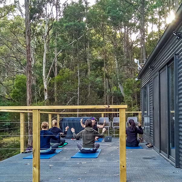Craig leads a yoga session during the photography workshop.