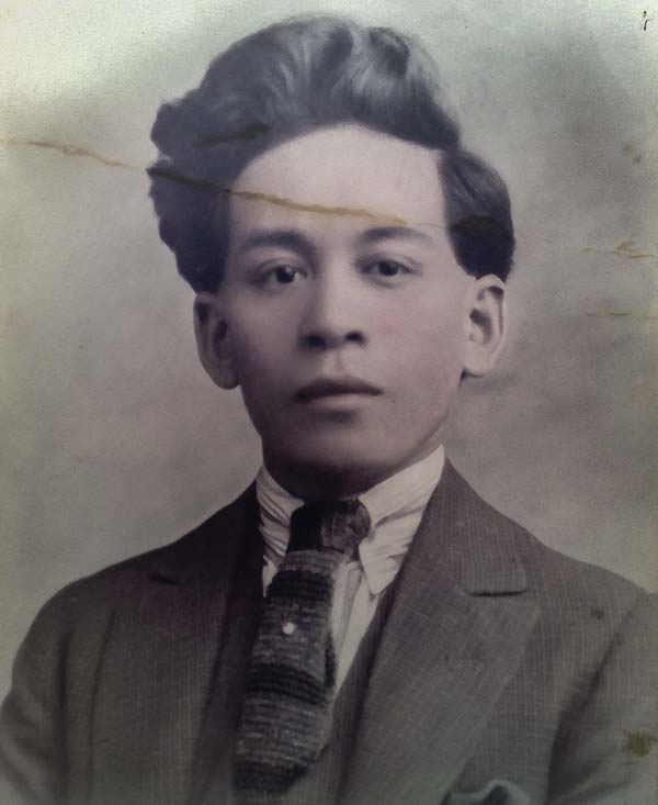 Young Chinese gentleman in a suit and tie (C 1920's is Chung Fon Hock, son of Foon Hock.