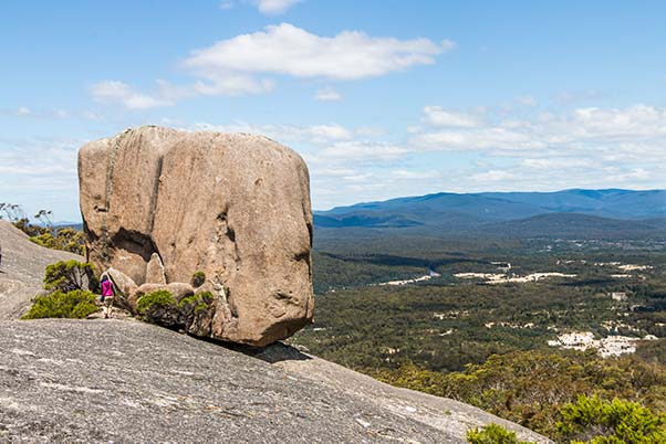 Walking towards cube rock over the granite slab.