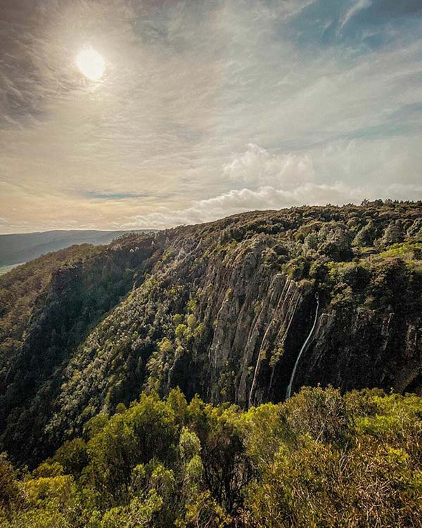 This is the view from Norms Lookout where you can see the deep single ribbon of the Ralphs Falls: our road trip in Tasmania