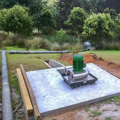 The same cement slab now has the micro hydro generator in position.
