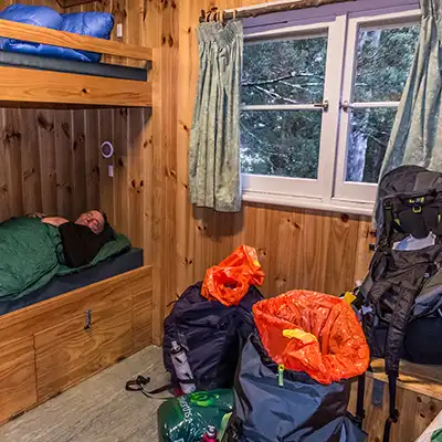 One of the two bedrooms in the Waldheim Cottage showing the double-decker timber bunk beds.