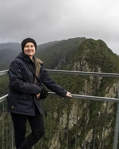 Christine standing on the top lookout platform above the Leven Canyon.
