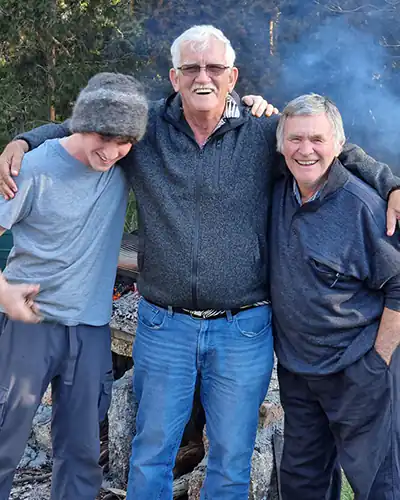 Three men enjoying a laugh