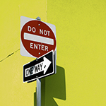 Small town unwelcome signs