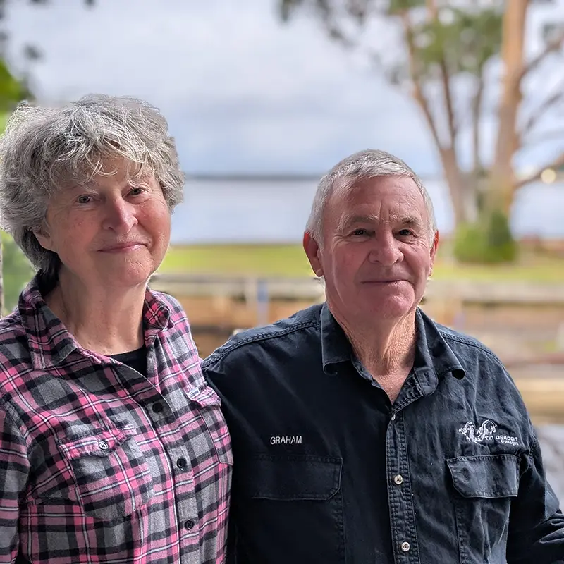 A portrait of Graham and Christine - your Tin Dragon Cottages hosts