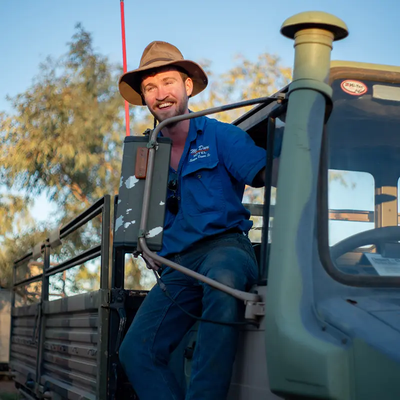 James Cashion at the door of an old MOG at Mt Dare Hotel in South Australia